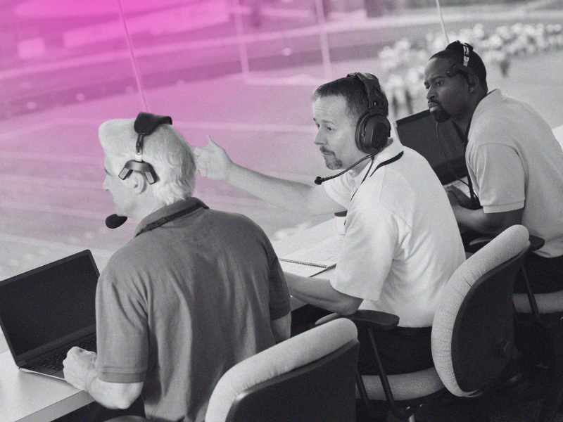 commentators in football broadcasting booth