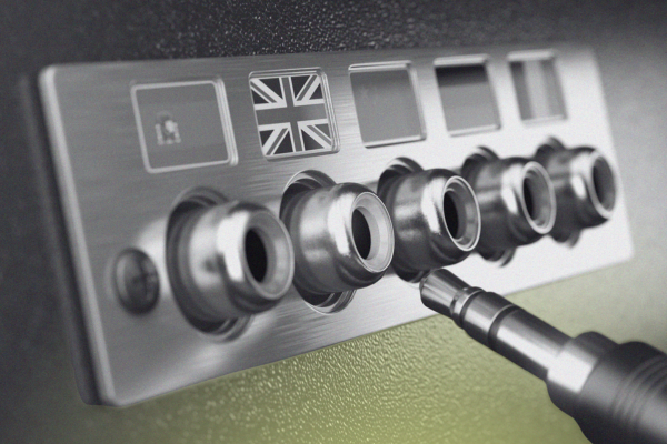 multiple headphone jacks with different countries' flags above each one